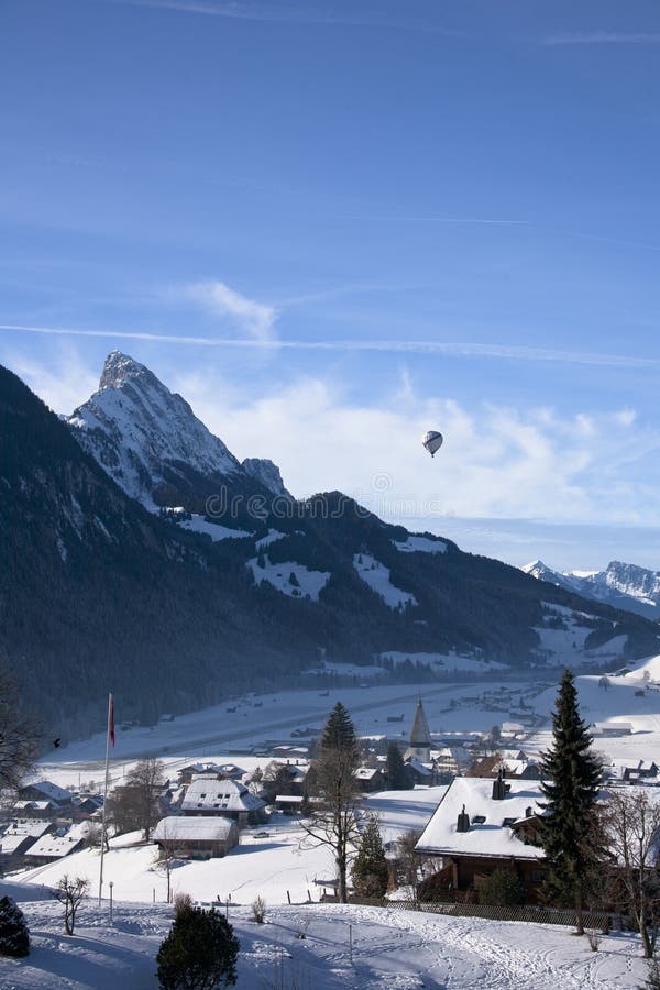 Landscape of Gstaad in Switzerland, with snow in winter, with a
