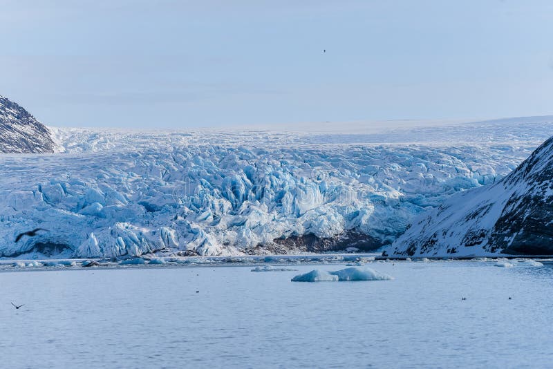 Landscape ice nature of the glacier mountains of Spitsbergen Longyearbyen Svalbard arctic ocean winter polar day sunset sky