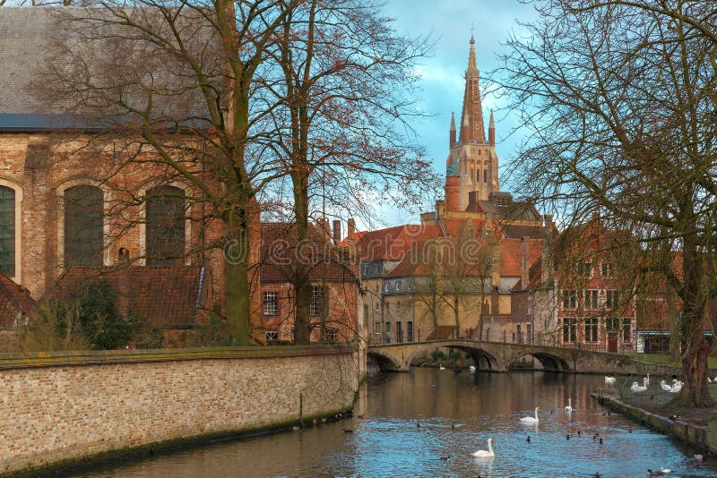 Landscape at Lake Minnewater and church in Bruges