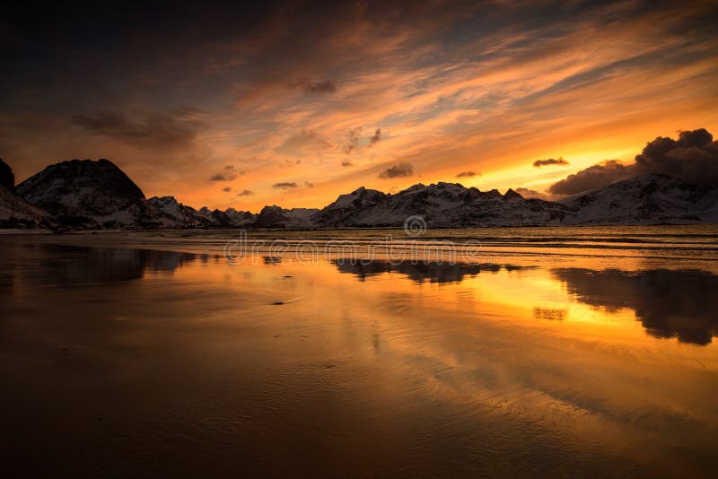 Landscape of Lofoten archipelago in Norway in winter time, , Ramberg beach sunset  .