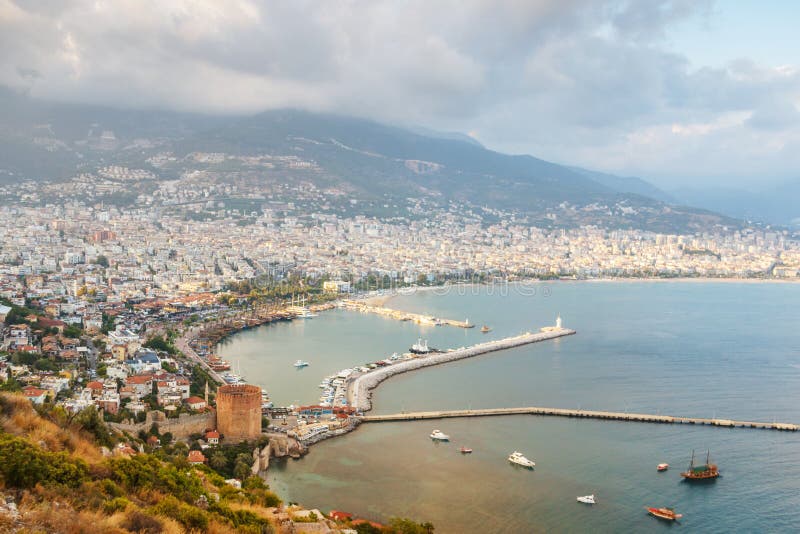 Landscape with marina and Red tower in Alanya peninsula, Antalya district, Turkey