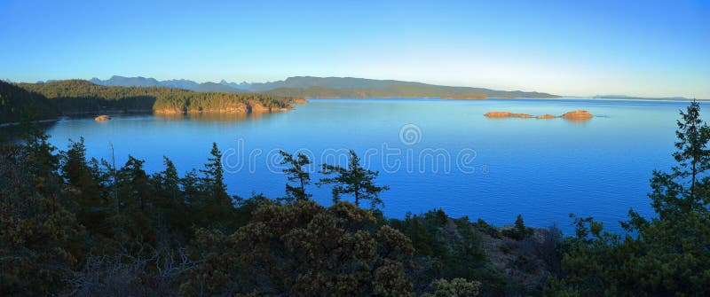 Landscape Panorama of Sunset at Cortes Bay from Red Granite Overlook, Cortes Island, Discovery Islands, BC, Canada