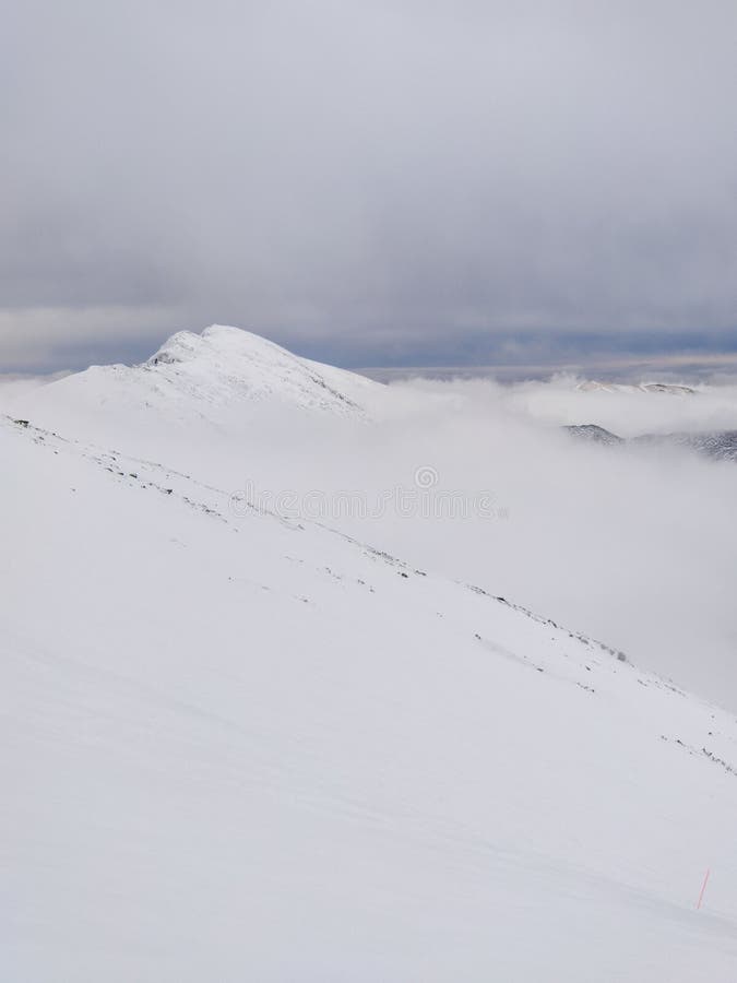 Landscape panoramic view of snowed winter tatra mountains