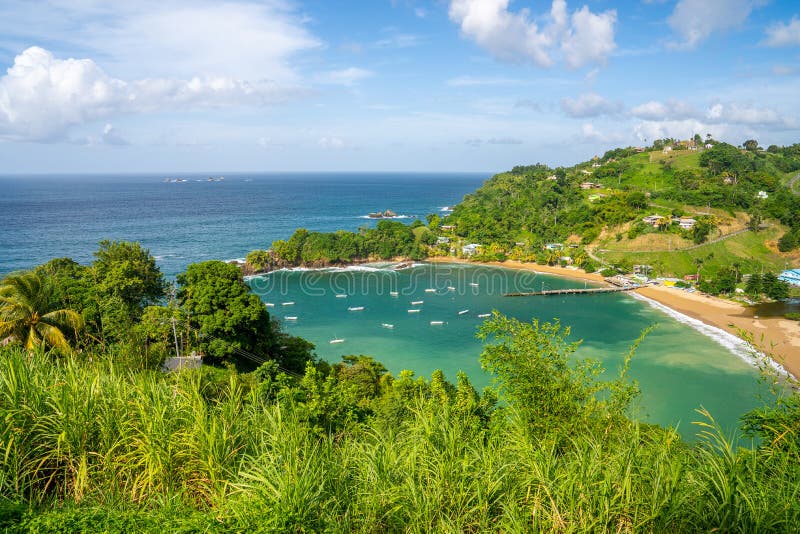 Landscape of the Parlatuvier bay surrounded by the sea under the sunlight in Trinidad and Tobago. A landscape of the Parlatuvier bay surrounded by the sea under royalty free stock photography Landscape of the Parlatuvier bay surrounded by the sea under the sunlight in Trinidad and Tobago. A landscape of the Parlatuvier bay surrounded by the sea under royalty free stock photography