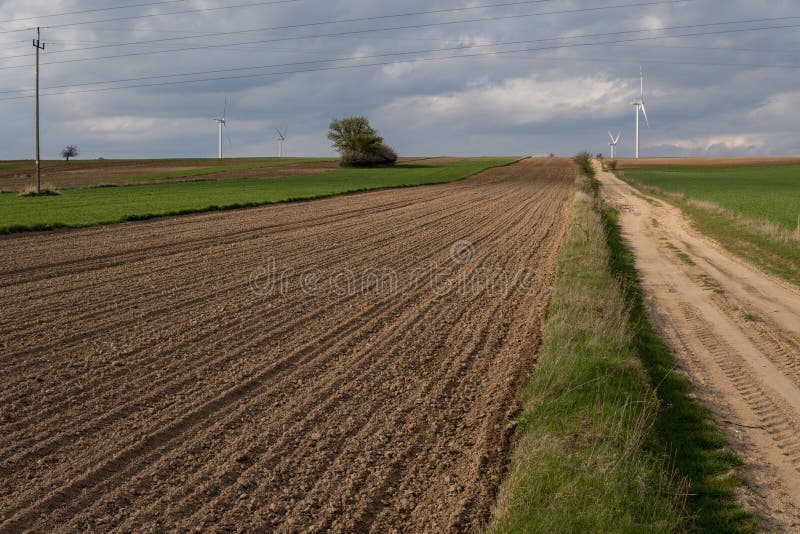 Landscape with plowed empty field royalty free stock image