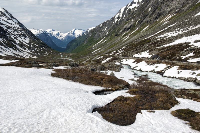Landscape with river, snow and mountains. View from old Strynefjell mountain road, National Tourist Road, Norway royalty free stock photos Landscape with river, snow and mountains. View from old Strynefjell mountain road, National Tourist Road, Norway royalty free stock photos