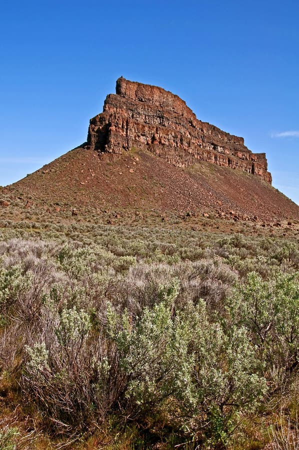 Landscape Sagebrush and High Rocky Mountain Bluff Stock Photo Image