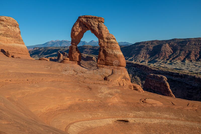 A landscape shot of the beautiful Delicate Arch at dusk at Arches National Park stock image A landscape shot of the beautiful Delicate Arch at dusk at Arches National Park stock image