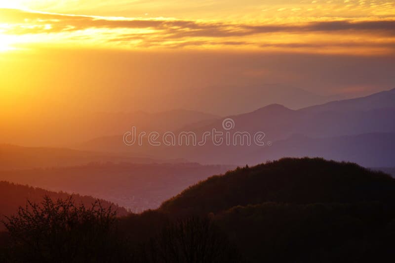 Mountainous landscape at sunrise