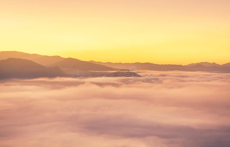 Landscape view of sunrise on high angle view with white fog in early morning over rainforest mountain royalty free stock photography Landscape view of sunrise on high angle view with white fog in early morning over rainforest mountain royalty free stock photography