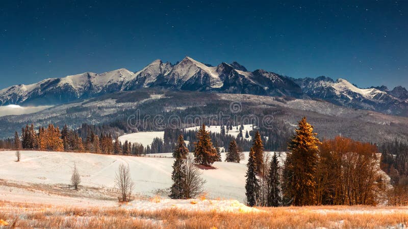 Landscape of winter mountains at night