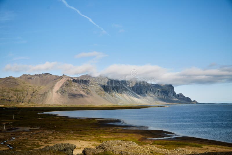 Landscapes in Iceland. Atlantic Coast. Mountain on the Horizon. Stock Image - Image of ocean