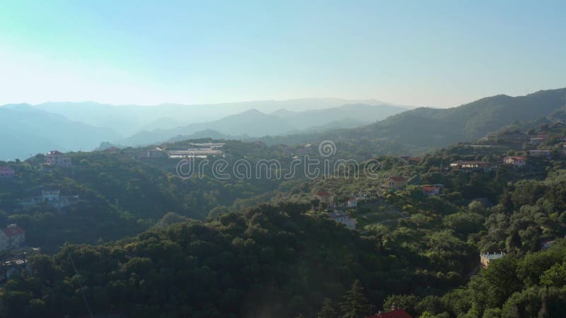 Aerial view of landscape in Garbasso, Celle Ligure comune, Savona province, regione Liguria region. Ligurian coastline with green hills. Aerial view of landscape in Garbasso, Celle Ligure comune, Savona province, regione Liguria region. Ligurian coastline with green hills