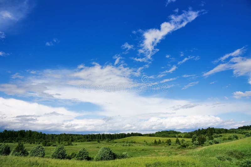 Landschap, blauwe hemel