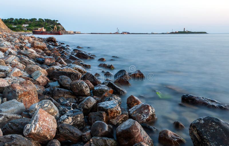 Scenic sunset landscape of stony Black Sea coast by Bolshoy Utrish village, Anapa, Russia. Scenic sunset landscape of stony Black Sea coast by Bolshoy Utrish village, Anapa, Russia