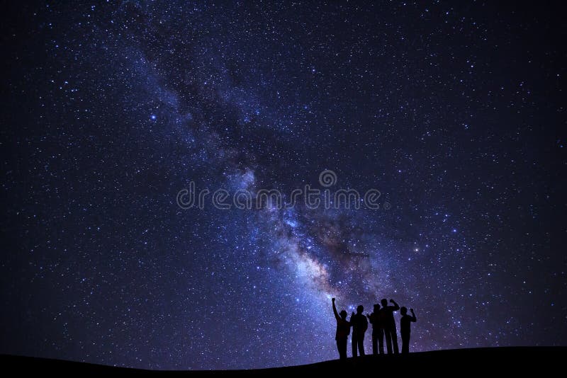 Landscape with milky way galaxy, Starry night sky with stars and silhouette of people standing happy man on high mountain. Landscape with milky way galaxy, Starry night sky with stars and silhouette of people standing happy man on high mountain.