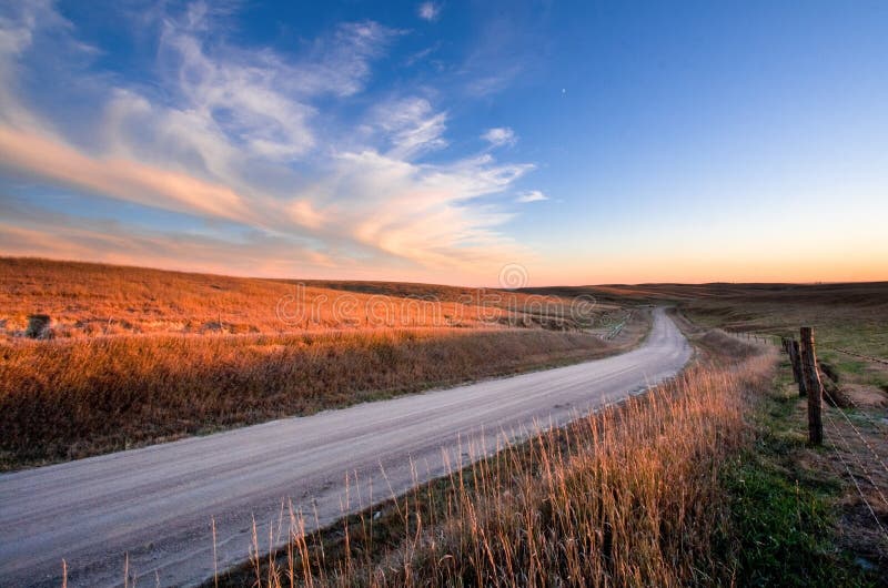 A country road winds through rolling hiils north of Overton, Nebraska. A country road winds through rolling hiils north of Overton, Nebraska.