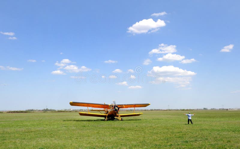 A agricultural plane on airport , blue sky. A agricultural plane on airport , blue sky.