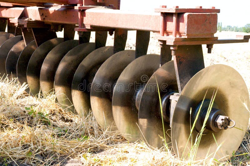 Closeup agricultural machine on the field. Closeup agricultural machine on the field