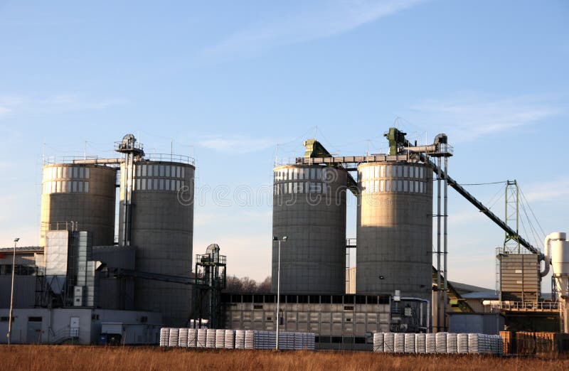 View of agriculture silos against blue sky. View of agriculture silos against blue sky