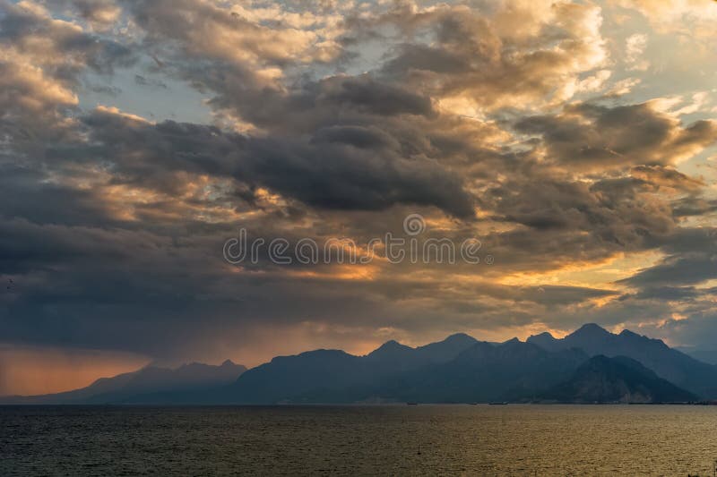 Lanscape of sunset over mountains and sea