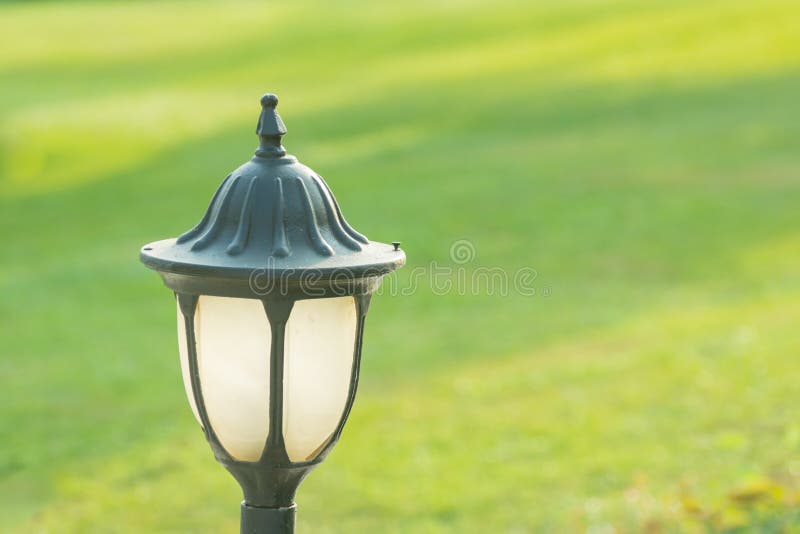 Lantern Near a Green Meadow in a Resort on Vacation Stock Photo Image