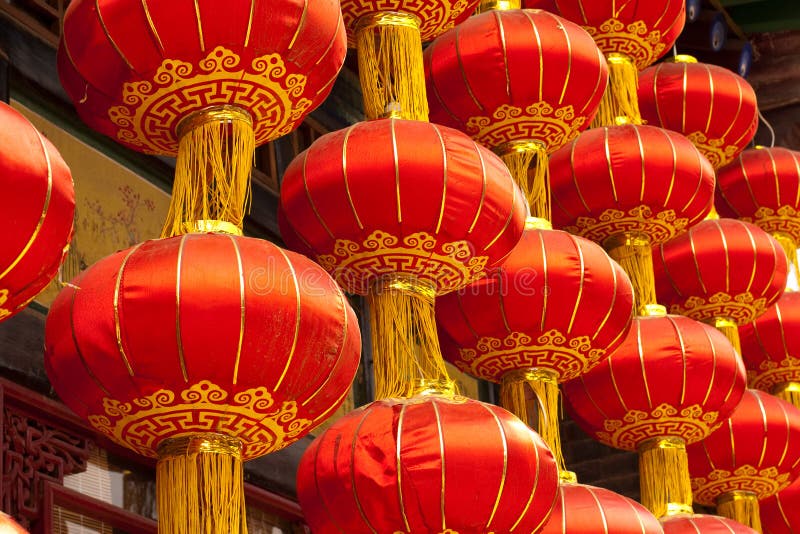 Red Chinese lanterns hanging from a traditional Chinese house in Pingyao. Red Chinese lanterns hanging from a traditional Chinese house in Pingyao