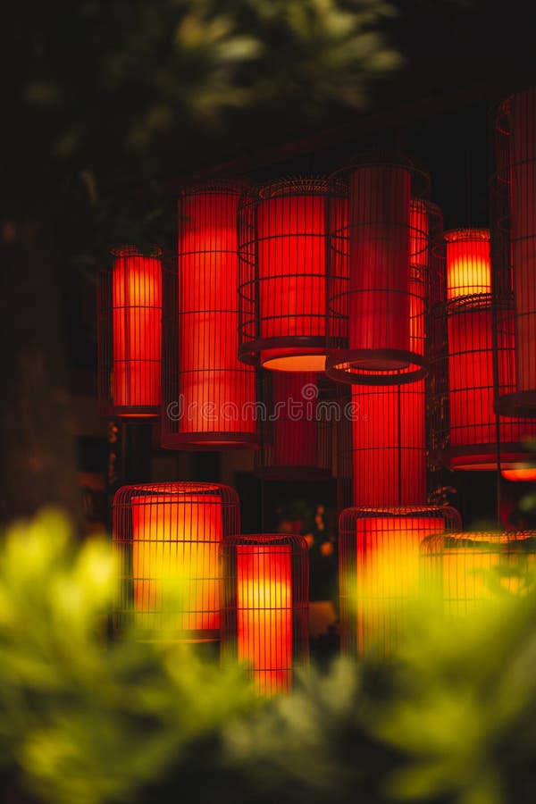 Lanterns hanging from the ceiling of a building illuminated royalty free stock photos