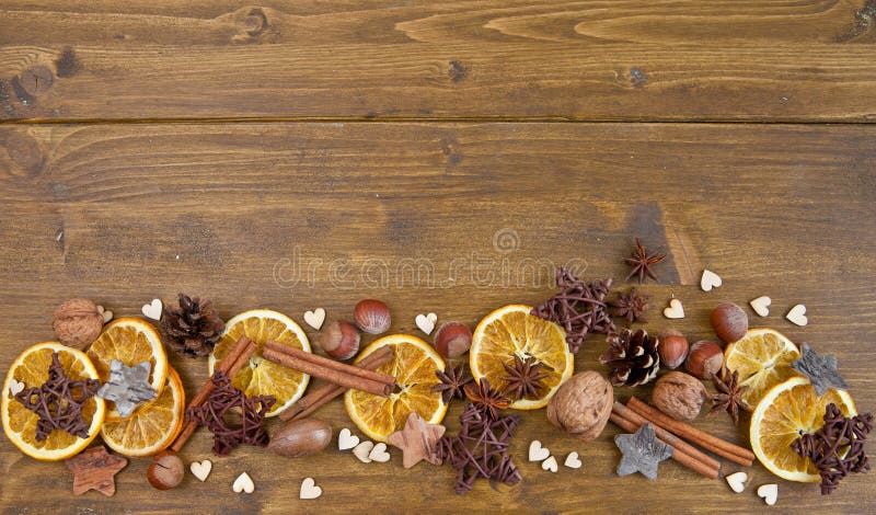 Rustic background with spices and nuts for christmas. Rustic background with spices and nuts for christmas