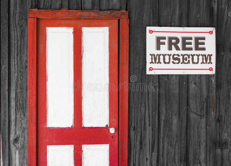 Lantlig röd och vit dörr till ett fritt museum royaltyfria foton Lantlig röd och vit dörr till ett fritt museum royaltyfria foton