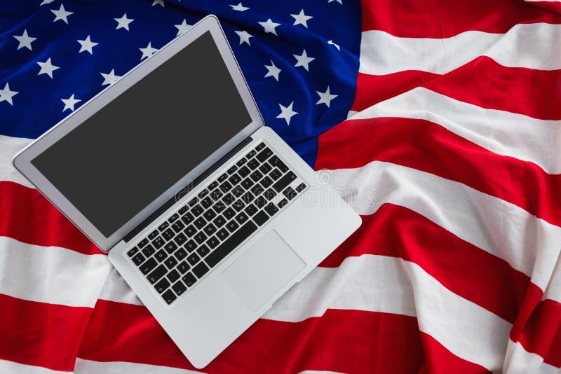 Laptop on American Flag with 4th July Theme Stock Photo Image of