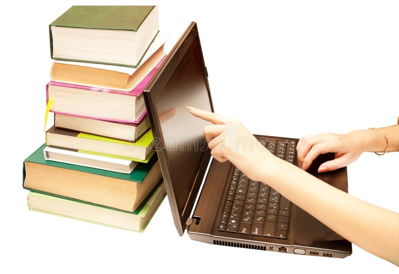 The laptop and books, encyclopedias