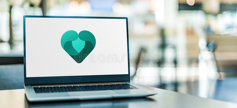 Laptop computer displaying logo of Microsoft family features royalty free stock photography