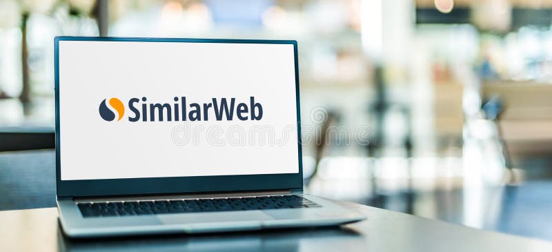 Laptop computer displaying logo of SimilarWeb. POZNAN, POL - FEB 6, 2021: Laptop computer displaying logo of SimilarWeb, a website that provides web analytics royalty free stock image