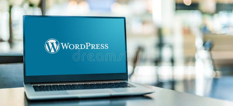 Laptop computer displaying logo of WordPress stock images