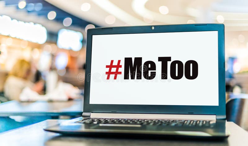 Laptop computer displaying the sign of MeToo movement stock photography