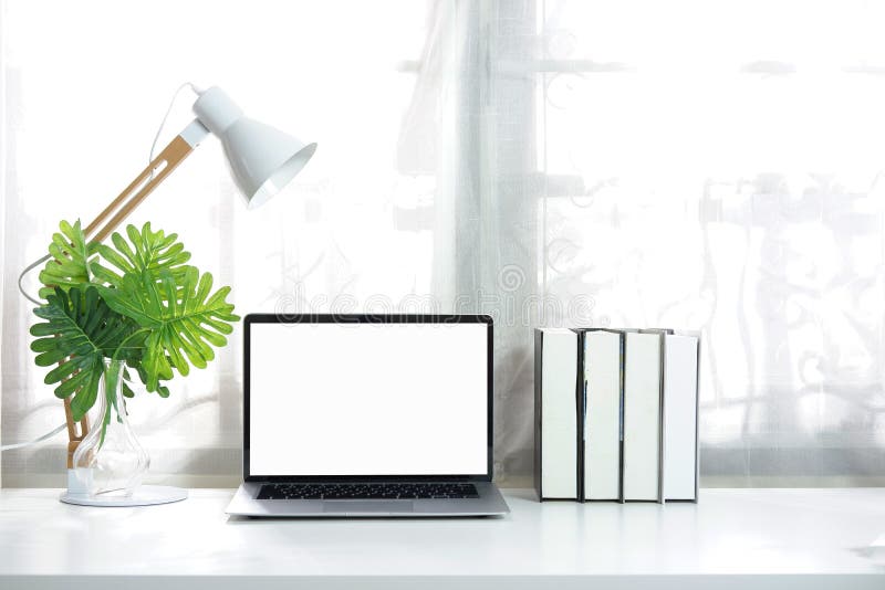 .Laptop Computer Screen Blank on a White Desk with Lamp, Vase, Leaf ...