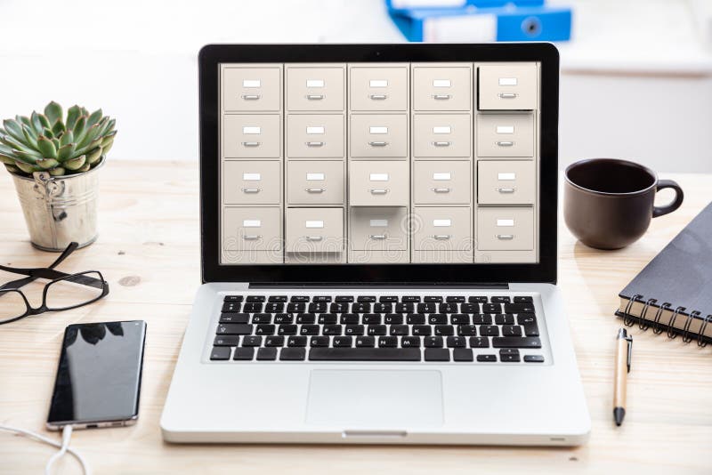 Laptop Data Storage Filing Cabinet On A Computer Screen Stock