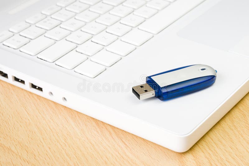 Laptop and Flash Pen Drive Arranged on Table Stock Photo Image of