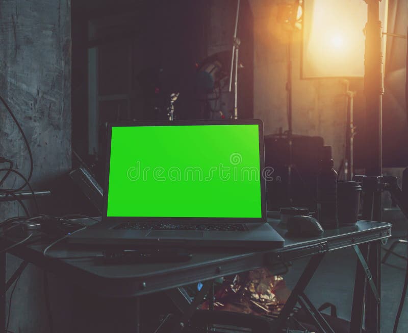 Laptop with a green screen stock image. Image of dark 112921793