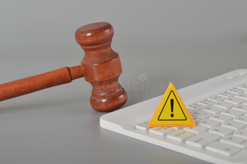 Laptop keyboard, warning sign and judge gavel. Hacker, data, computer stock photography