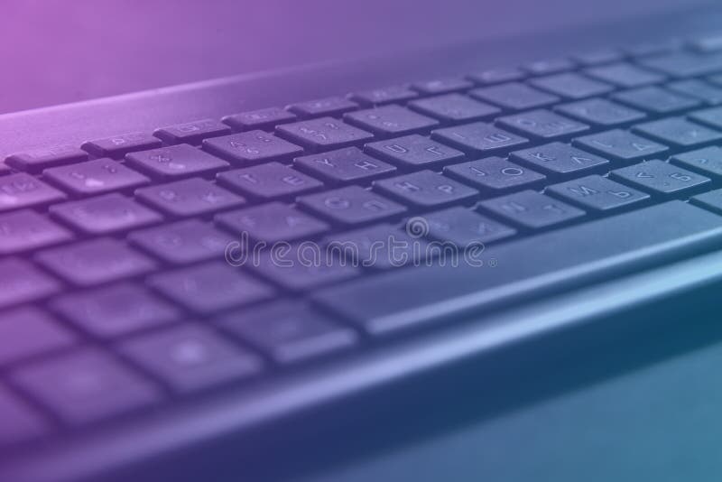 Laptop Keys are Tinted Blue. Laptop Keyboard Tinted Blue Stock Photo