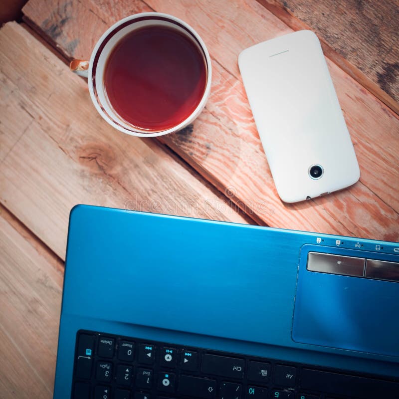 Laptop with mobile phone stock image. Image of message 45267571