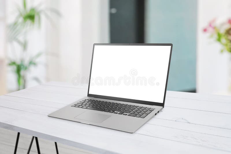 Laptop mockup on desk. Clean flat composition. Isolated display for web page mockup stock photos