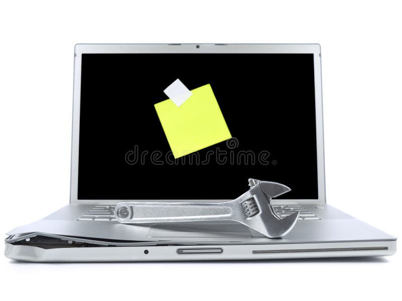 Laptop with sticky note and tool