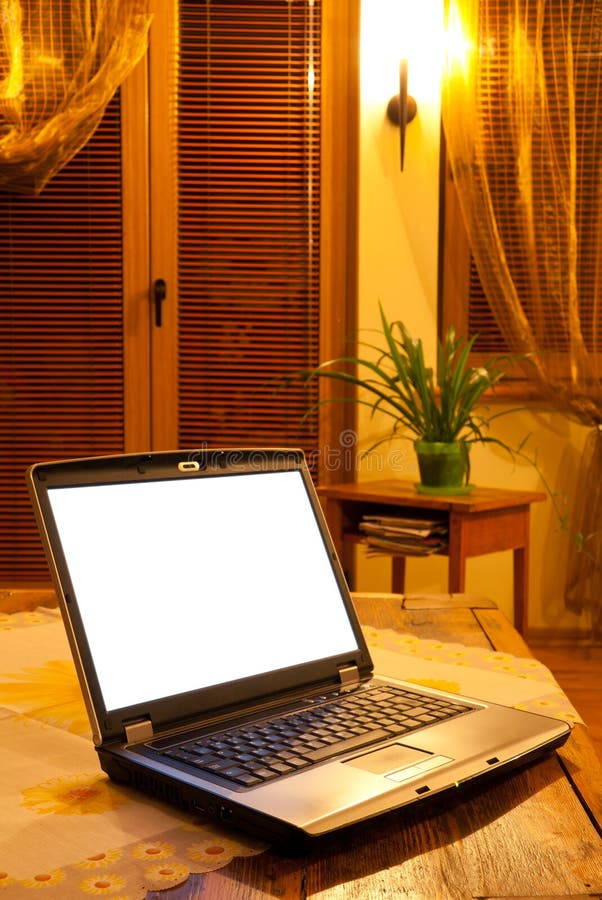 Laptop on table stock image. Image of computer, living 15682205