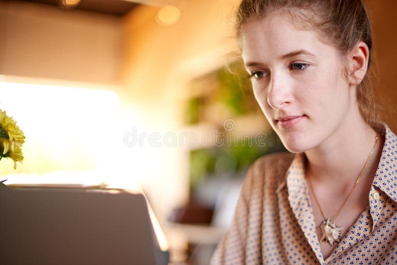 Laptop, thinking and woman in cafe with business ideas, remote work and social media management. Typing, editing and freelancer girl in coffee shop with content writer, online research or development. Editing project stock images, royalty-free photos and pictures