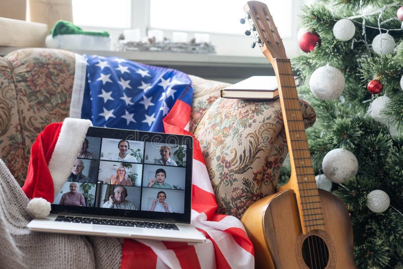 Laptop with video chat at christmas and usa flag