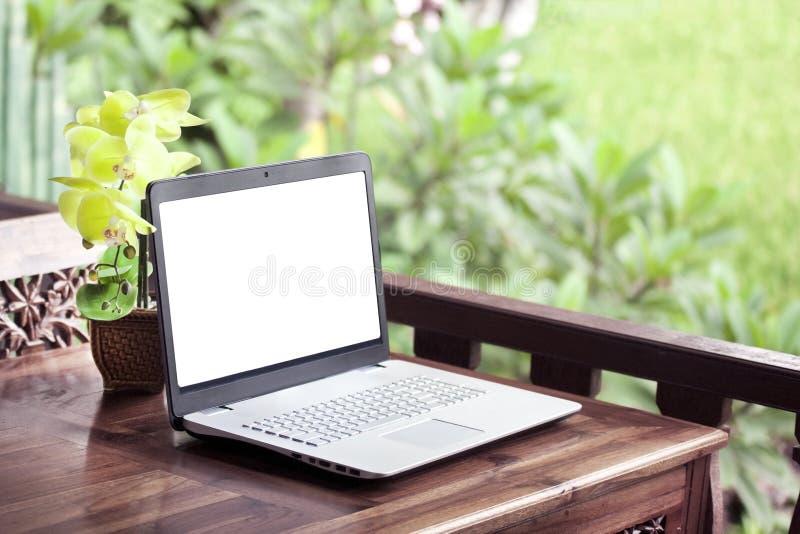 Laptop on wooden table nature stock photos Laptop on wooden table nature stock photos