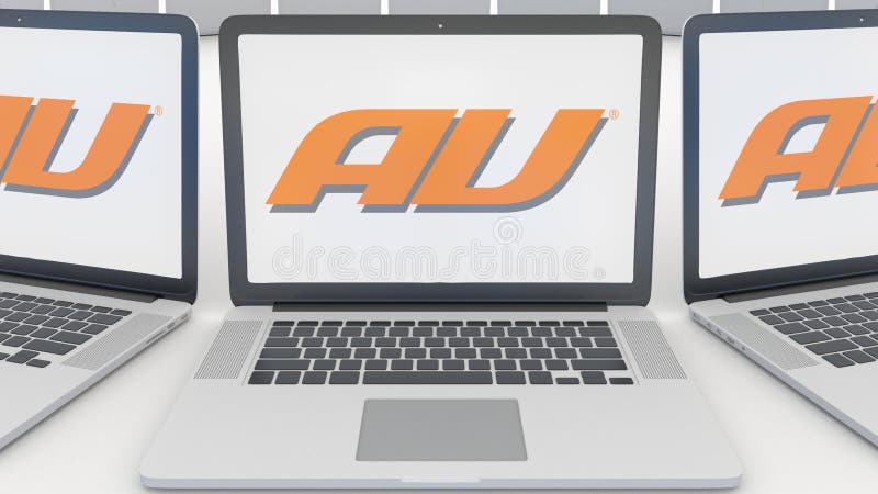 Laptops with au mobile phone company logo on the screen. Computer technology conceptual editorial 3D rendering royalty free illustration